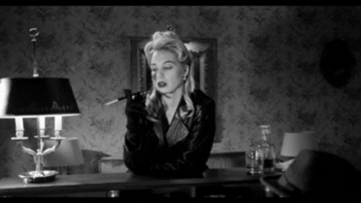 Before and after video restoration of a movie clip using a Video Quality Enhancer.